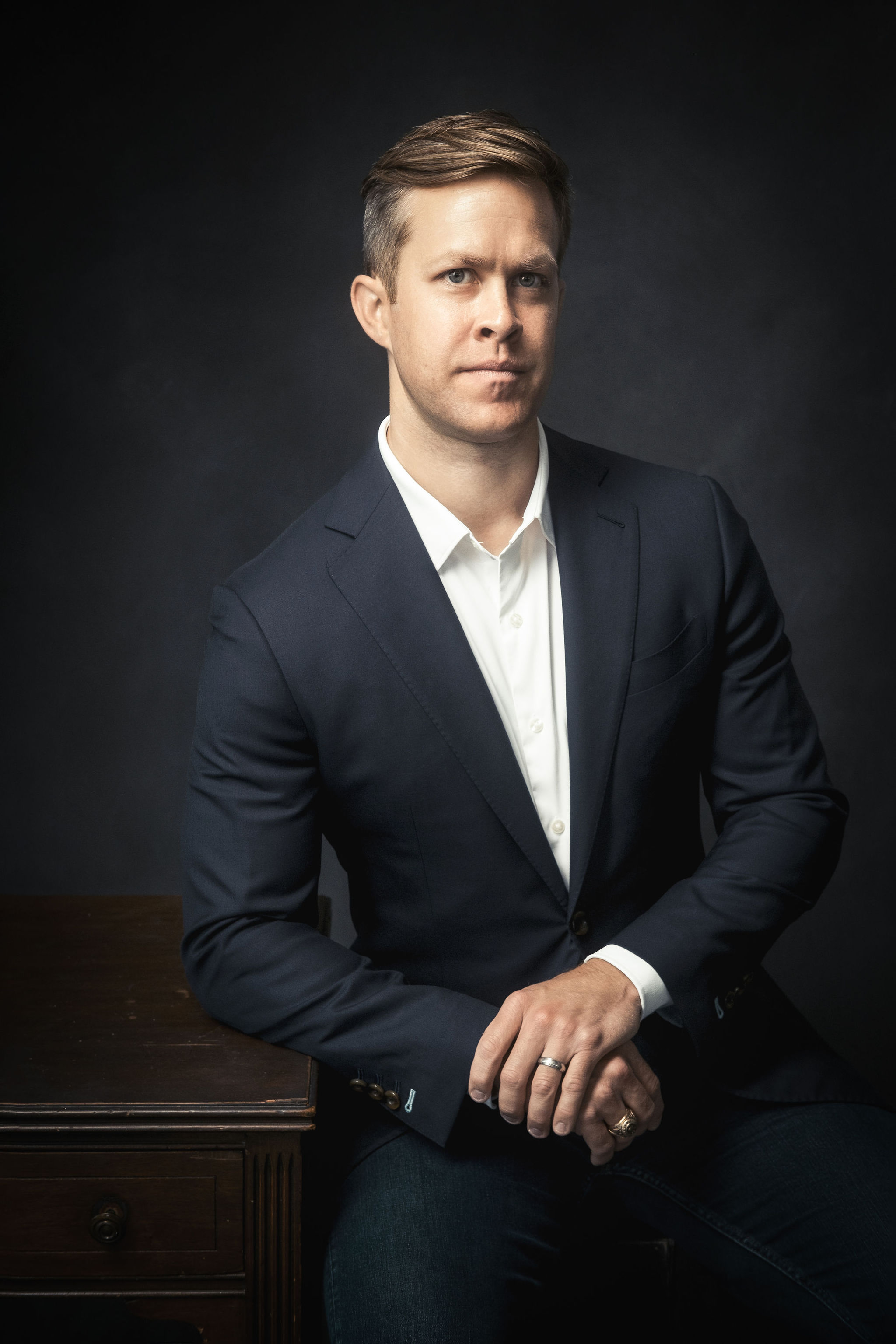 Portrait of Brennan Collins, Managing Partner of Unabated Capital LLC